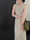 Kukombo's main person wears V-neck cross strap waist slim dress female commuting temperament long skirt 6055