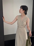 Kukombo's main person wears V-neck cross strap waist slim dress female commuting temperament long skirt 6055